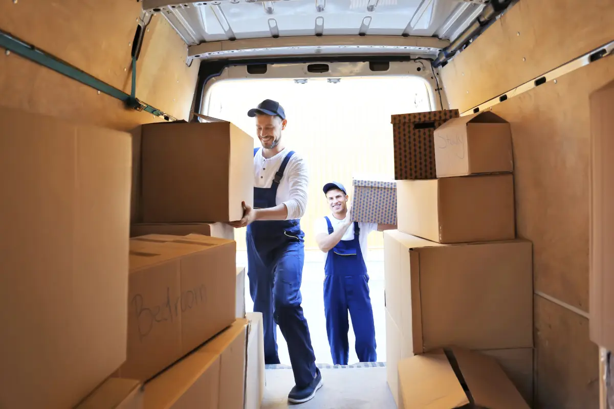 Movers loading and unloading truck in Astoria Queens storage and relocation help 22 Moving